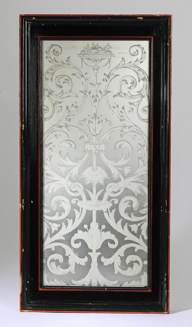 Acid etched mirrored panel with scrolling acanthus: Acid etched mirrored panel in the Renaissance Revival taste, of rectangular form, having a continuous scrolling acanthus motif in a polychrome birch frame; the mirror panel, 40.5"h x 17.5"w; overall,