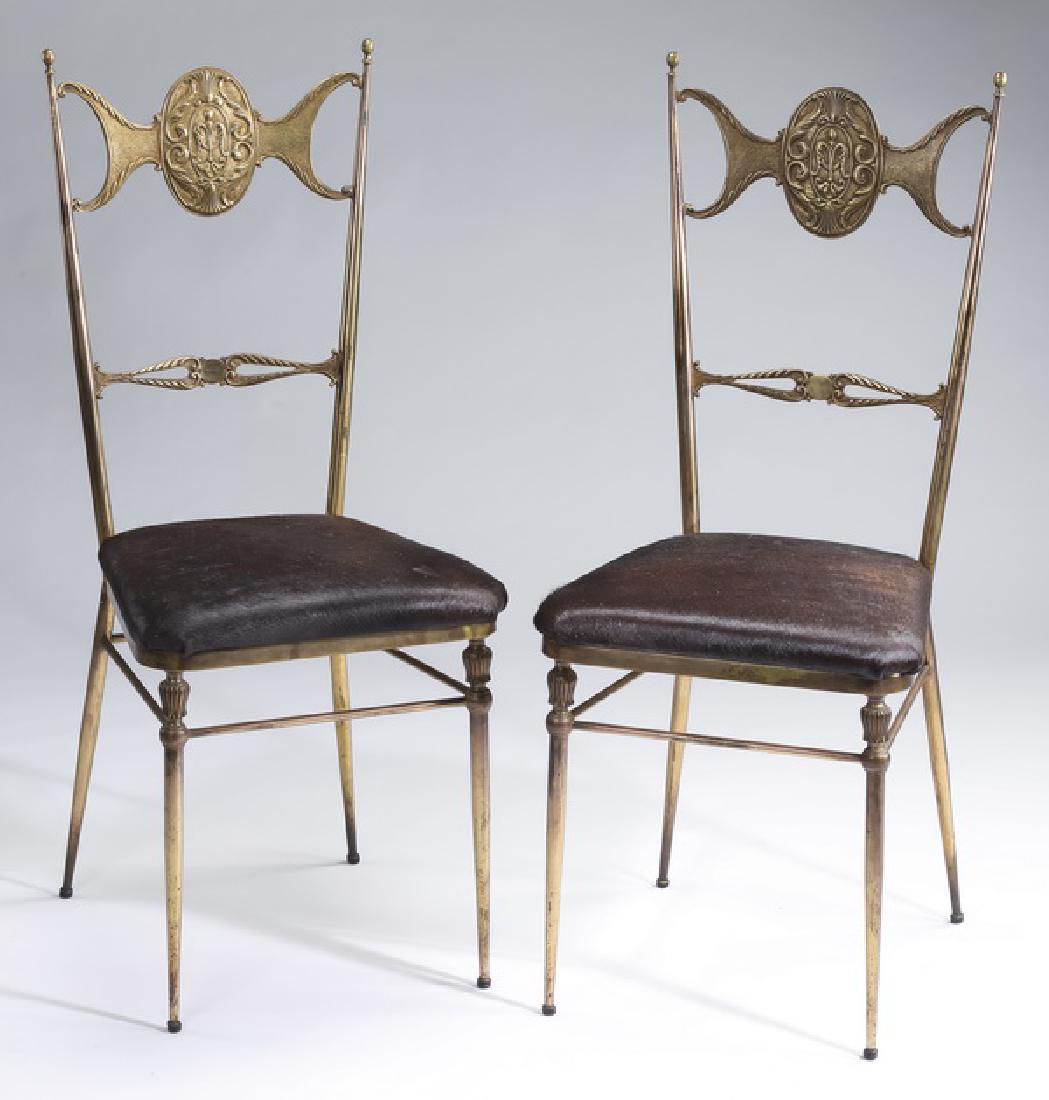 (2) Mid-century brass chairs w/ hair on hide seats (1 of 2)