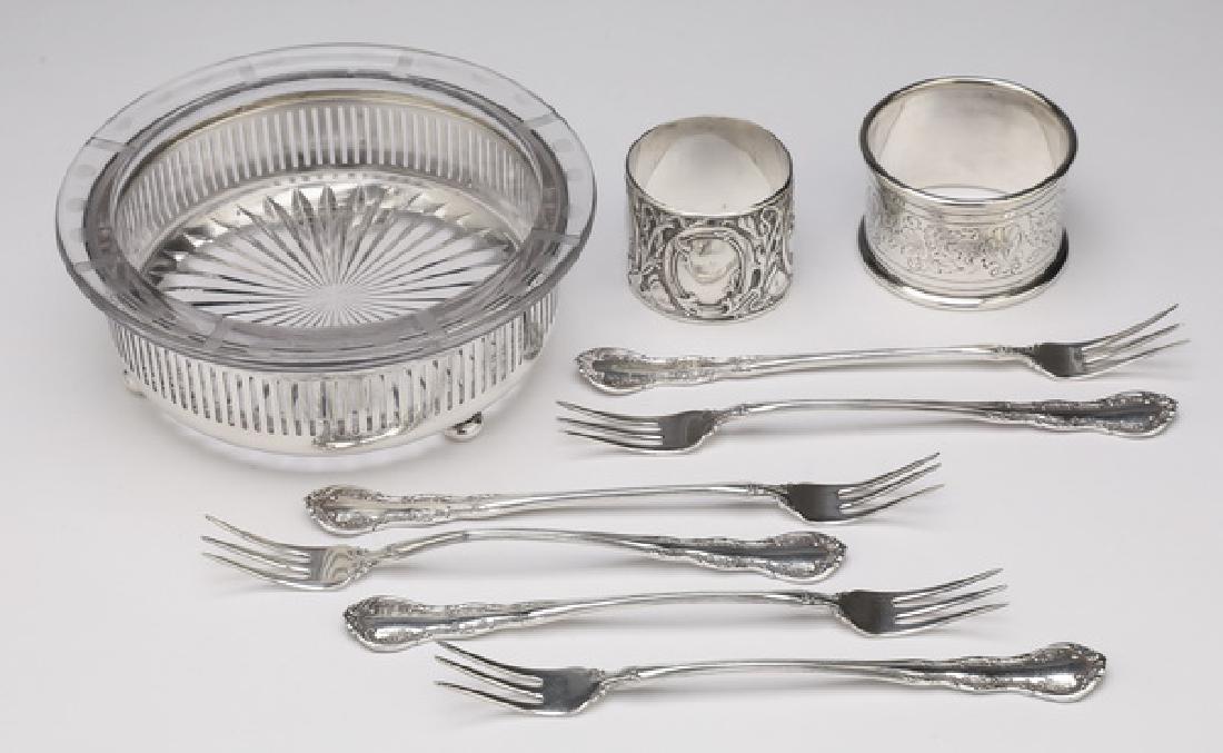 (9) Pcs vintage sterling table accessories: Vintage silver table accessories, comprising: (1) etched glass bottle coaster in a silver stand by F. & J.B. Nickel Silver, 2"h x 5"dia; (1) 'Hermann' engraved napkin ring, marked 'GD 800', 1.5"h x 2"