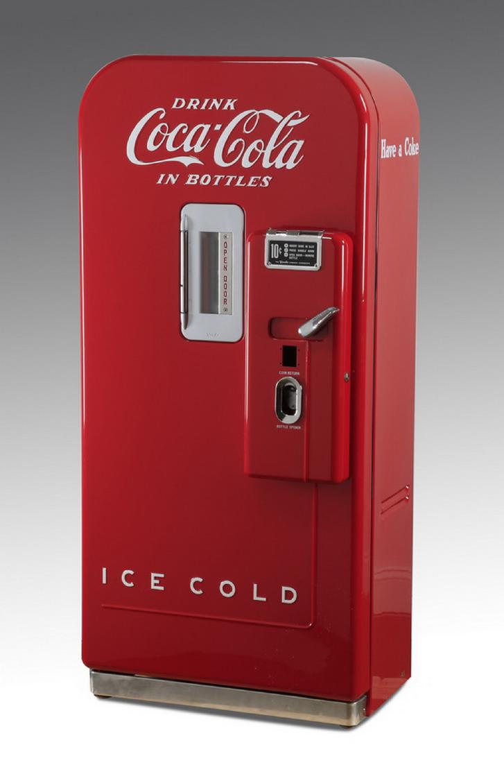Circa 1948 Vendo Coca-Cola machine, 58"h: Vintage Coca-Cola machine, 1948-1957, a Vendo Model 39 mechanical single drink dispenser with a restored case, offering 8 oz. bottles for 10 cents, holds 39 bottles, 58"h x 27"w x 20.5"d.