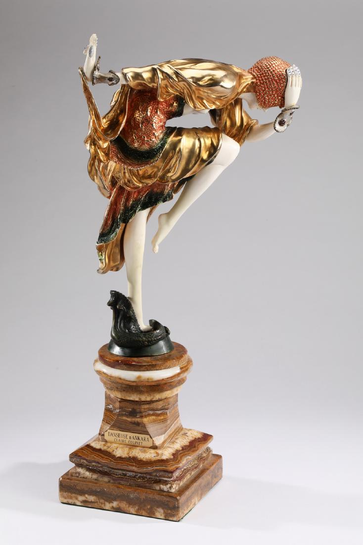 Orientalist bronze 'Danseuse D'Ankara', 25"h: Orientalist bronze 'Danseuse D'Ankara,' after the original by Claire Colinet (French 1885-1948), executed in polychrome cold painted bronze and ox bone, depicting a semi-nude female dancer bent at the
