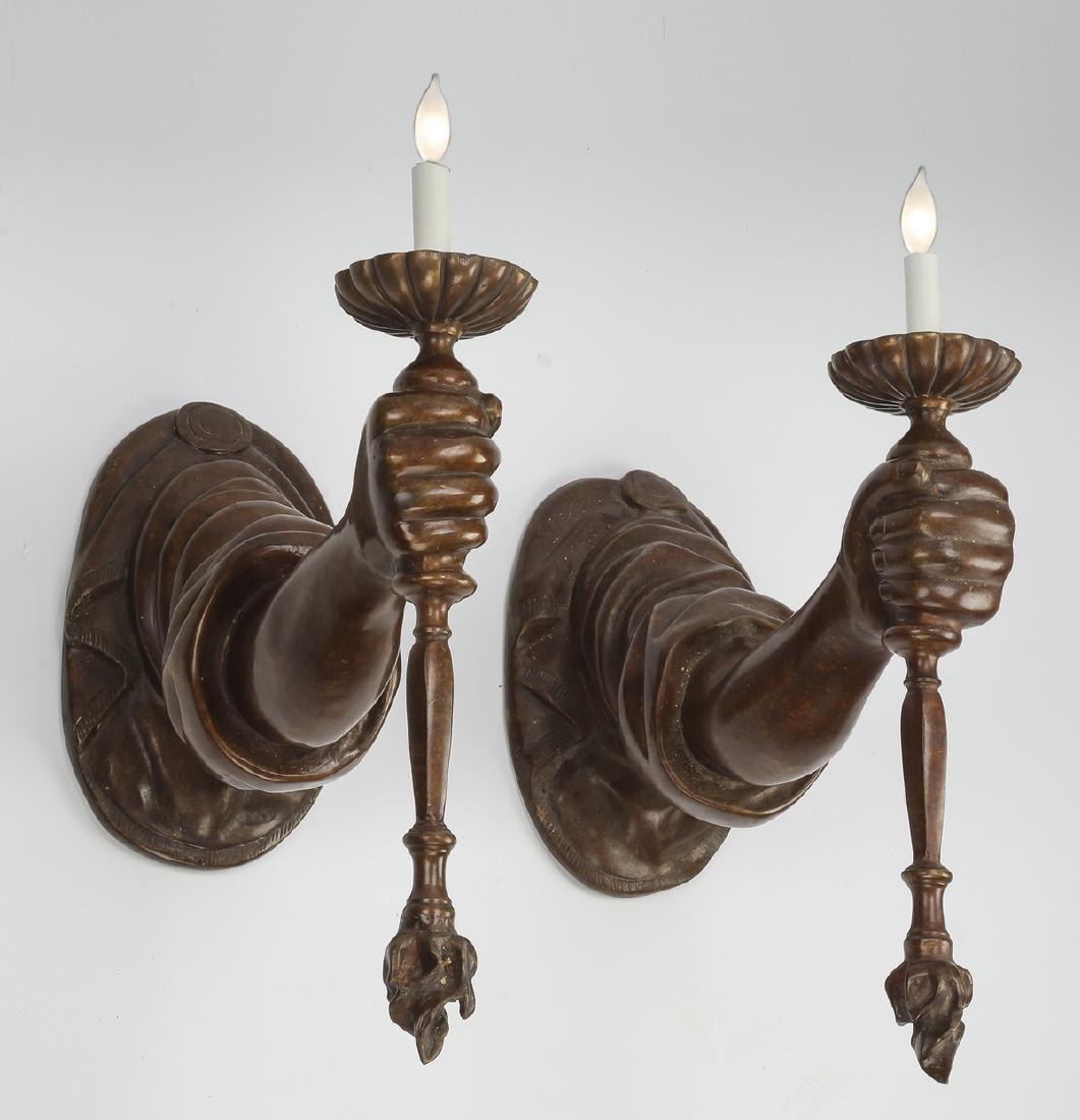(2) Bronze figural arm-shaped sconces, electrified (1 of 2)