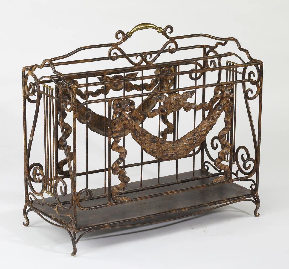 Maitland-Smith Neoclassical inspired iron canterbury: Maitland-Smith Neoclassical inspired wrought iron canterbury, having a brass handle surmounting iron scrollwork, centering a foliate cartouche flanked by trailing ribbons, with lyre-form sides, all re