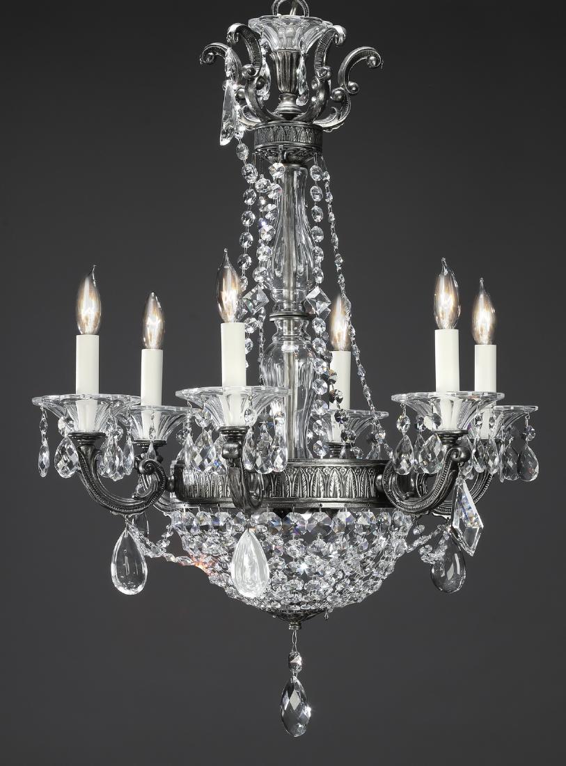 Empire style crystal 6-light chandelier, 28"h: Empire style crystal 6-light chandelier, having a crystal cup hung with crystal pendants issuing 'S' form scrolling arms. above a crystal double baluster standard draped in crystal swags, supported by