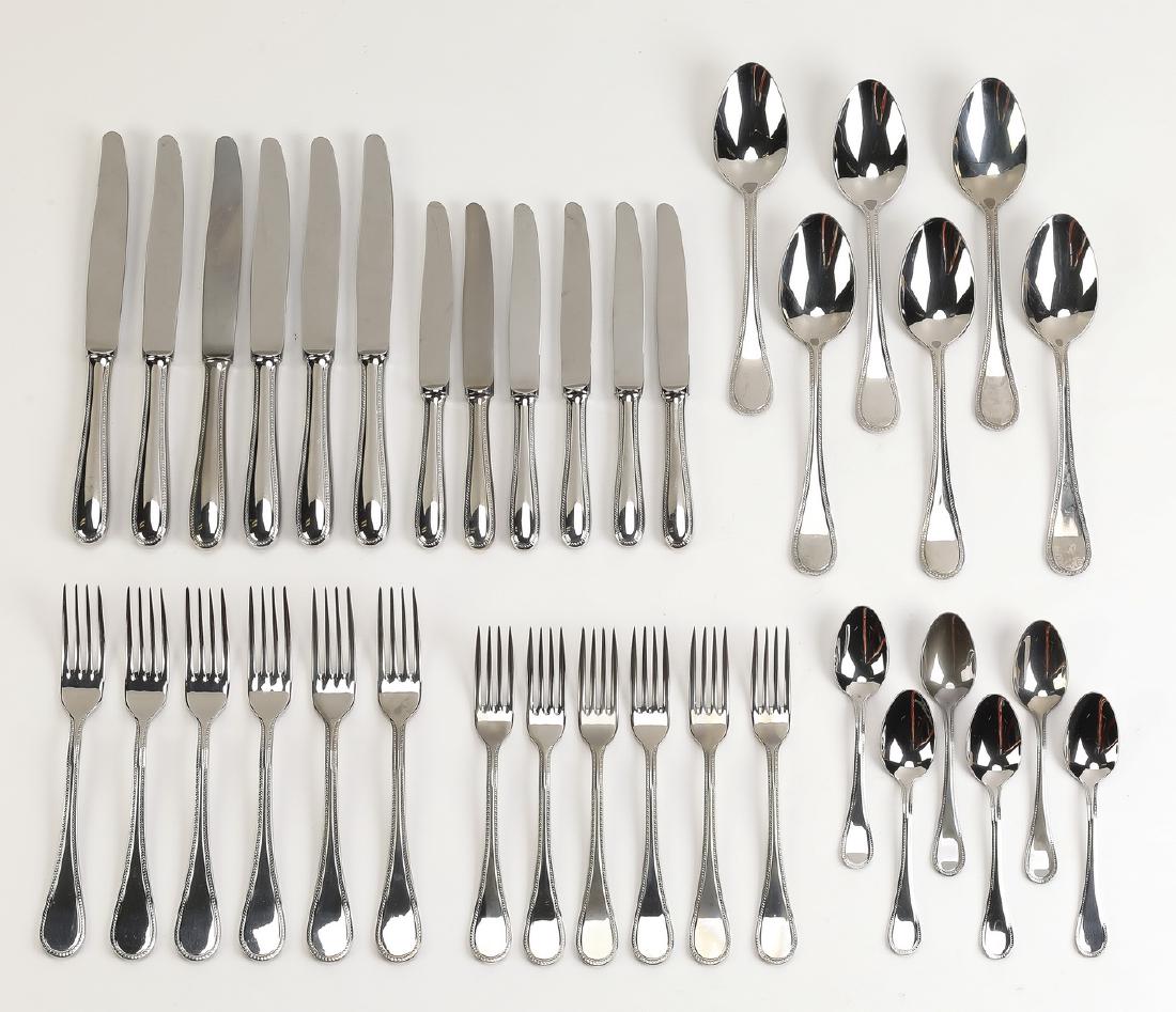 (36) pcs Christofle 'Mimosa' stainless flatware: (36 pcs) Service for six of Christofle stainless steel flatware in the Mimosa pattern, of teardrop form with a beaded edge, comprising (6) each dinner knives, dinner forks, luncheon knives, luncheon f