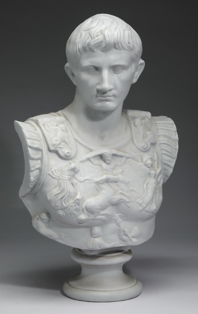 Painted ceramic bust of Augustus Caesar as Centurion: Paint decorated ceramic bust of Augustus Caesar as Centurion, the Roman emperor wearing ceremonial armour depicting a scene of figures and a horse and chariot in relief, the whole rising on an associa