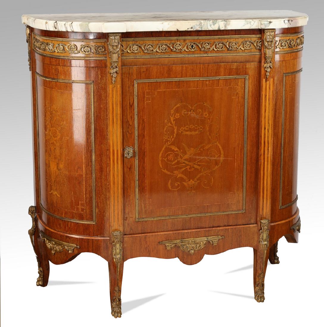 19th c. French bronze mounted marble top commode: Late 19th century French bronze mounted satinwood demi-lune commode in the Louis XVI taste, the white marble top surmounting the conforming case with gilt bronze frieze of repeating foliate scrollwork