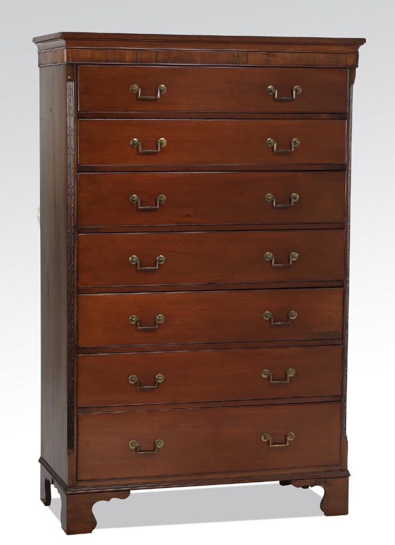 19th c. Georgian style mahogany gentleman's chest: 19th century Georgian style mahogany gentleman's chest, having a shaped cornice, above seven drawers, flanked by canted corners with carved geometric patterning, the whole rising on bracket feet, 65.5