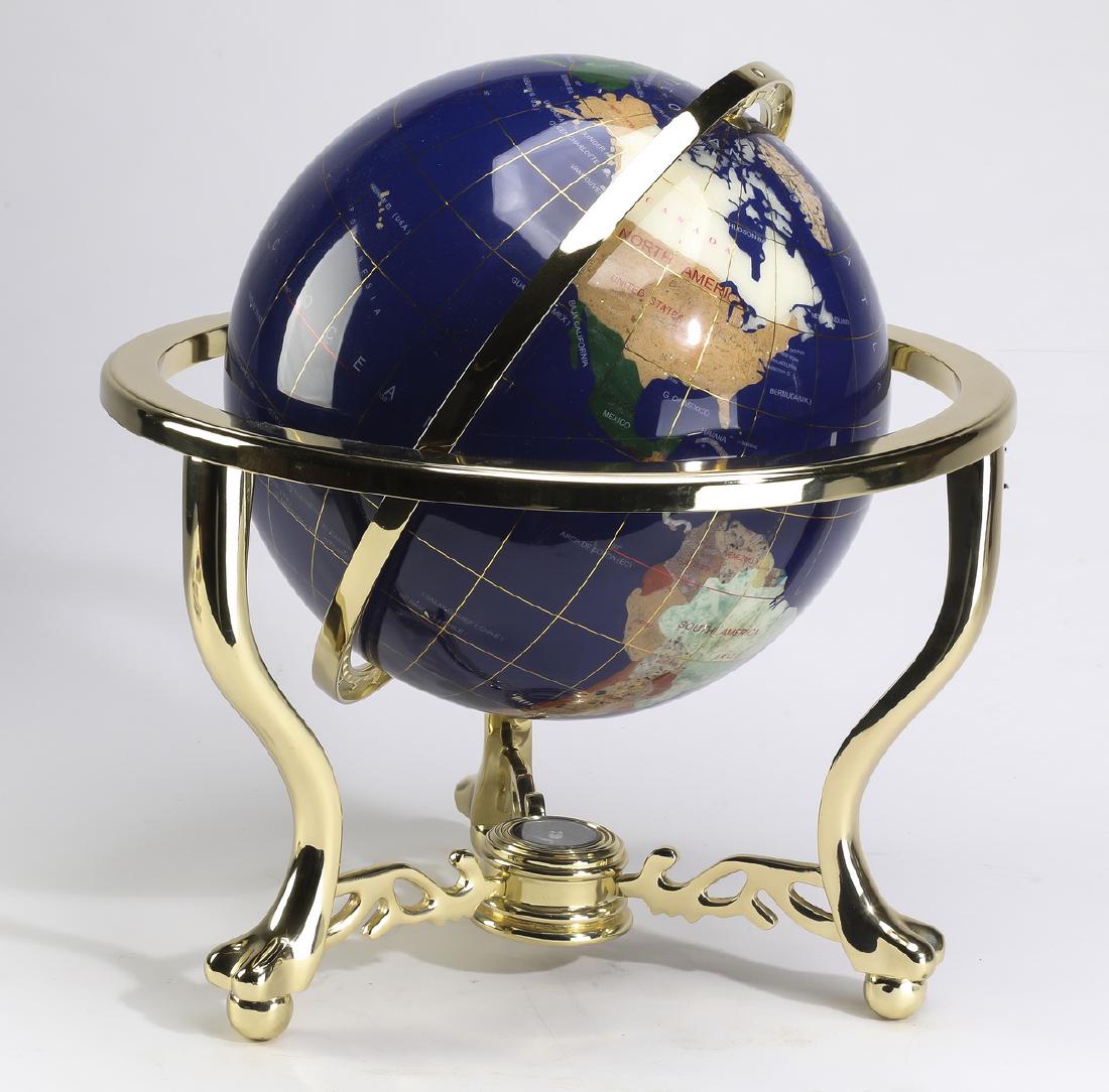Handcrafted semi-precious stone globe on brass stand: Handcrafted semi-precious stone globe on brass stand, composed of semi-precious gemstones including lapis, red aventurine, rich jade, picture jaspar, red jaspar, mookaite, turquoise, mother of pearl, 