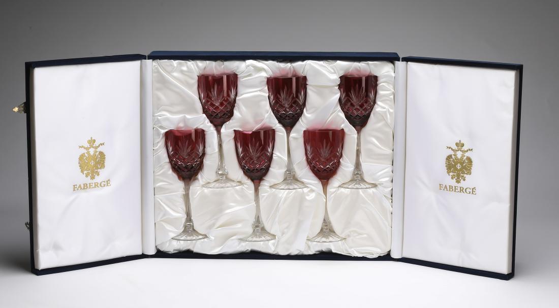 (8) Faberge ruby crystal wine glasses w/ fitted case: Set of eight Faberge crystal ruby cut to clear wine glasses in the 'Odessa' pattern, comprising (6) red wine glasses and (2) white wine glasses, all maker marked, and having an original fitted case fo