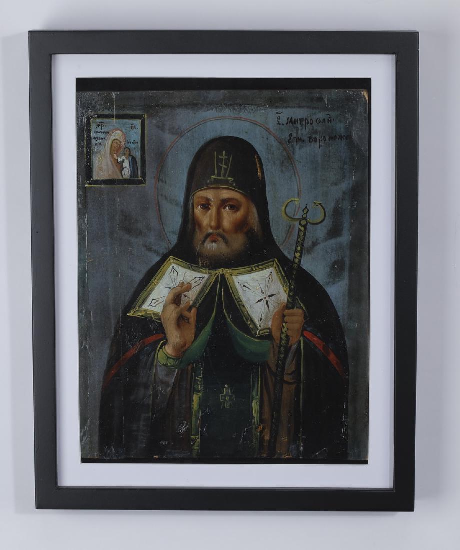 Russian Orthodox icon of Mitrophan of Voronezh: Russian Orthodox icon, 19th century, executed in oil on panel, depicting Mitrophan of Voronezh, the whole encased in a glass and wood kiot, 12"h x 9"w, overall size including kiot 15.75"h x 12.5"w x 2
