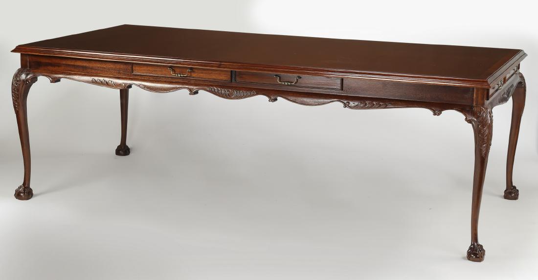 Chippendale style mahogany executive desk, 95"w: Chippendale style mahogany executive desk or conference table, having a rectangular top, above a wide apron with a scalloped edge and two drawers on each side, plus one drawer on each end, the whole r