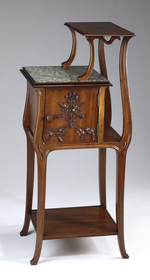 Early 20th c. French Art Nouveau nightstand: Walnut French Art Nouveau nightstand, early 20th century, in Japanese inspired asymmetrical form, with a display shelf surmounting a green marble top in molded frame, over an off-set cabinet, having a