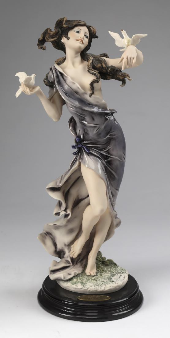 Giuseppe Armani limited edition sculpture, 'Daphne': Giuseppe Armani limited edition art sculpture, 'Daphne,' executed in composition material with hand painted detail, depicting a dancing nymph with a dove alighting on each hand, having a signature on