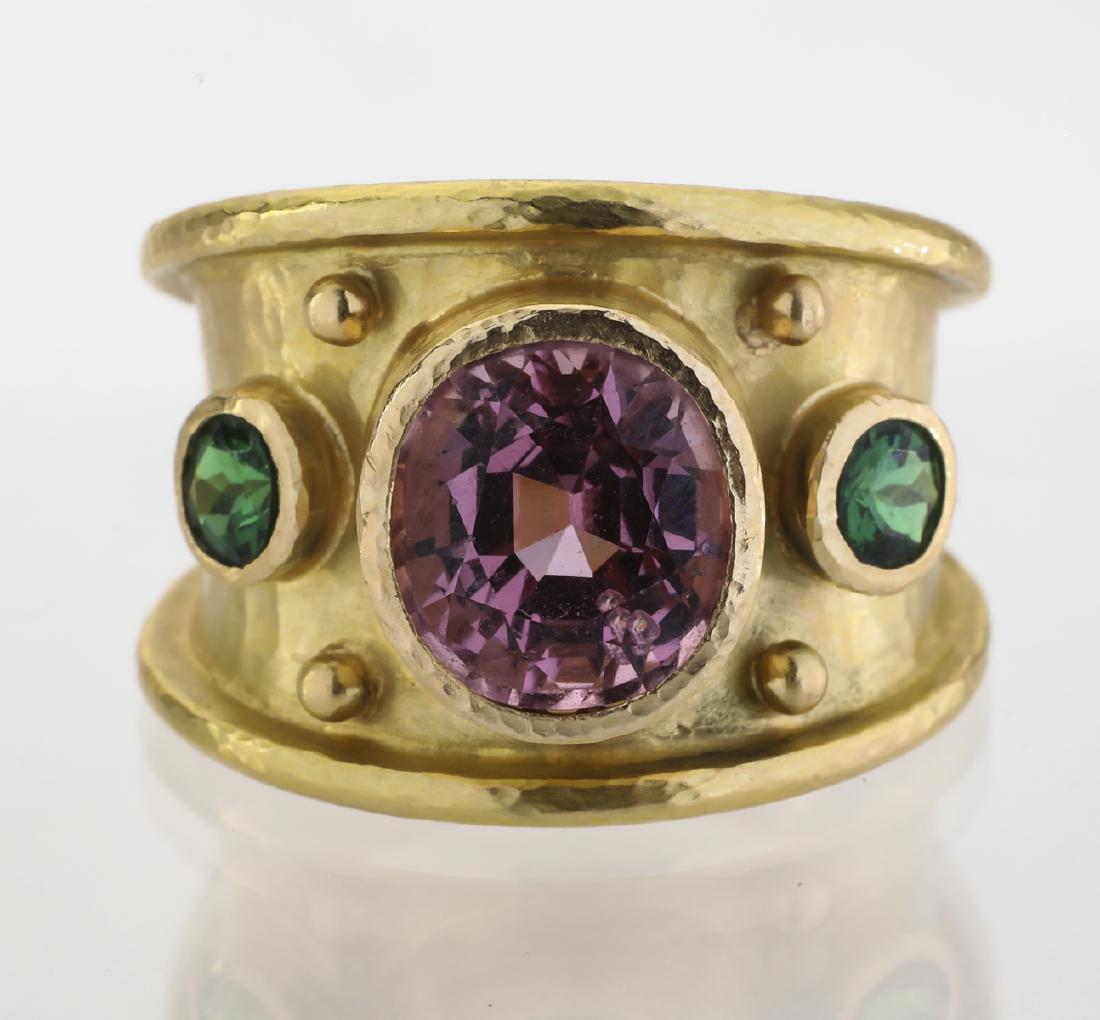 Elizabeth Locke 19k, spinel and Tsavorite ring: Elizabeth Locke 19k yellow gold pink spinel and Tsavorite garnet tapered cigar band ring, centering a bezel set oval pink spinel weighing 3.83cts flanked by round Tsavorite garnets weighing .50ctw on