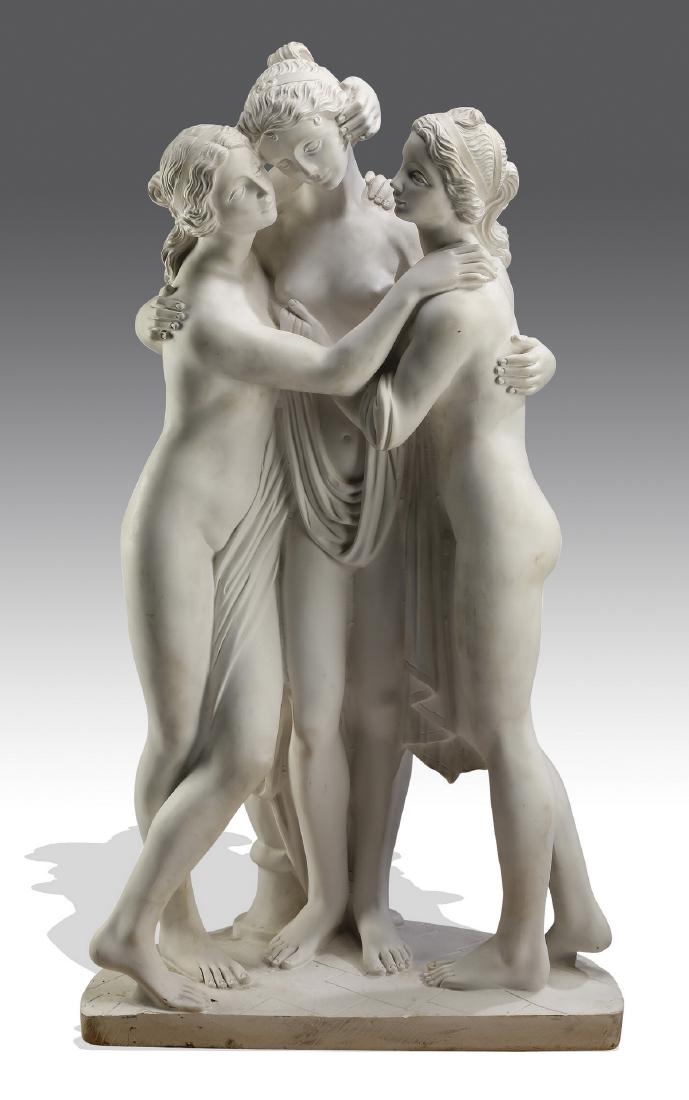 Cast stone sculpture of the Three Graces, 41"h: Cast stone sculpture of the Three Graces, after the Roman antiquity, depicting the Graces partially draped with arms wrapped around one another and a vase behind, resting on a demi-lune base, 40.5"h x