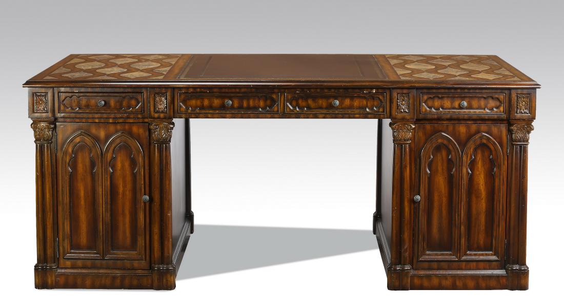 Maitland-Smith Gothic inspired partner's desk: Maitland-Smith Gothic inspired partner's desk, having a central gilt leather panel, flanked by stone inlays, resting on two short drawers centering one long drawer, above two cabinet doors accented wi