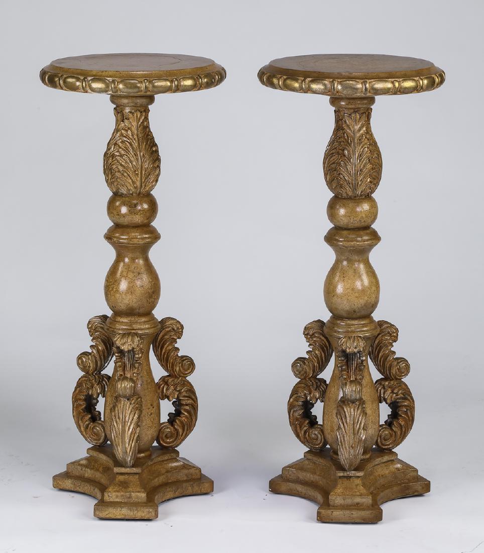 (2) Renaissance style paint decorated pedestals, 44"h: Pair of paint decorated wood pedestals in the Renaissance taste, each having a round top with an egg and dart apron above an acanthus and urn carved standard, terminating to acanthus scrollwork, and r