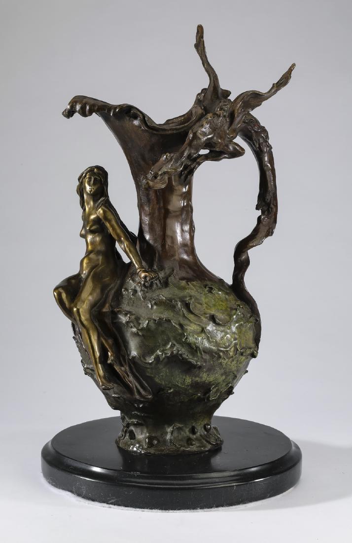 Bronze ewer with seated nymph and dragon handle: Contemporary bronze figural ewer in the manner of Marcel Debut (French, 1865-1933), having a writhing winged dragon handle, and a nymph resting on the shoulder of the pitcher, raised on a round marble