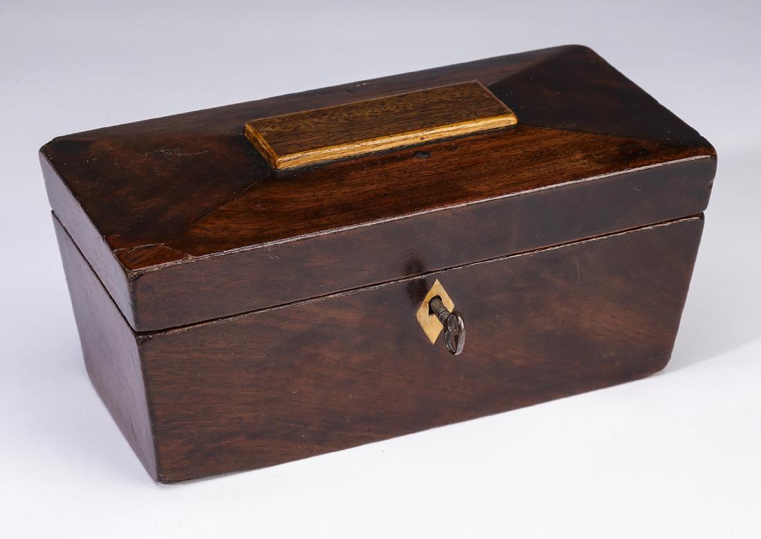 Mahogany Federal period tea caddy: Mahogany Federal period tea caddy, having a coffered top and ivory escutcheon opening to an interior fitted with two compartments each having a lid with double line stringing and an ivory knob, 4"h x 