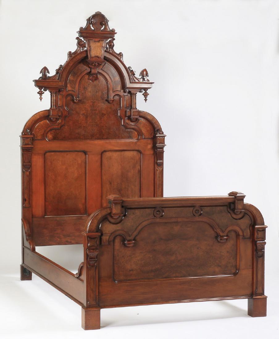 Highback bed attributed to Thomas Brooks: American Renaissance Revival high backed bed, in the manner of Thomas Brooks, 19th century, executed in mahogany with burl veneer, the arched crest carved with central shell cartouche above a molded g