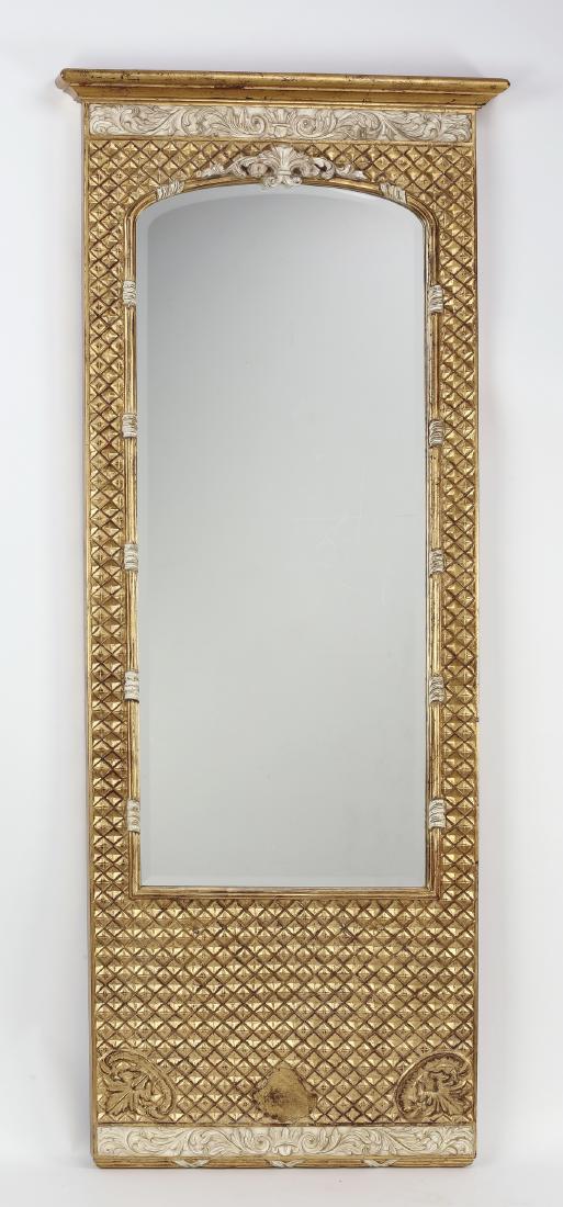 Italian hand carved giltwood mirror 76"h: Italian hand carved giltwood mirror by Harrison Gil, of rectangular form, having a stepped cornice surmounting a carved acanthus scrollwork frieze above a repeating diamond carved ground, centering an
