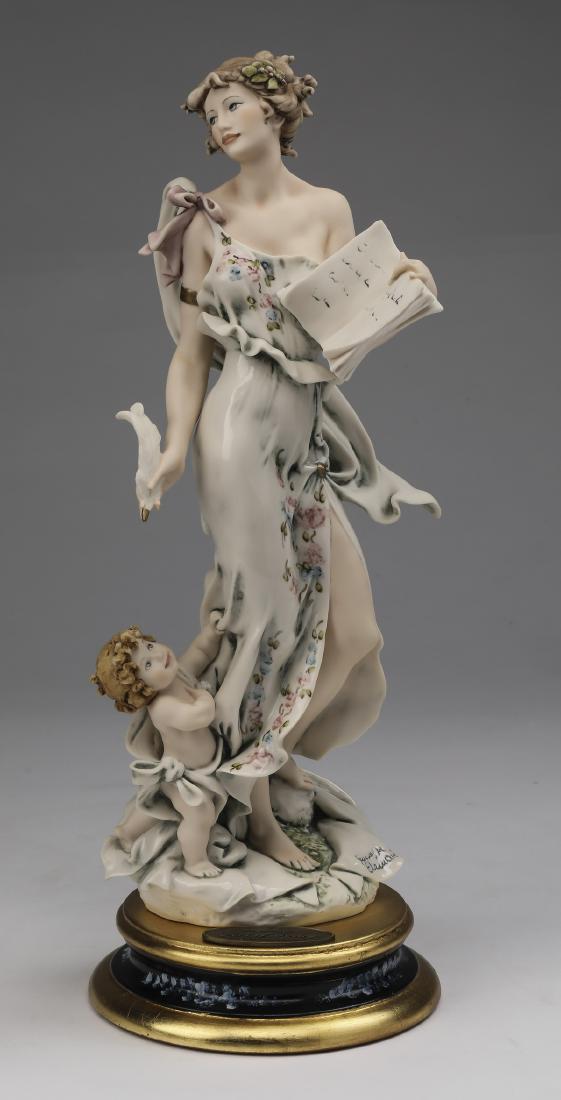 Giuseppe Armani limited edition, 'Art of Poetry': Giuseppe Armani limited edition art sculpture, 'Art of Poetry,' executed in composition material with hand painted detail, depicting a nymph holding a book and a quill pen, having the Naples mark on t