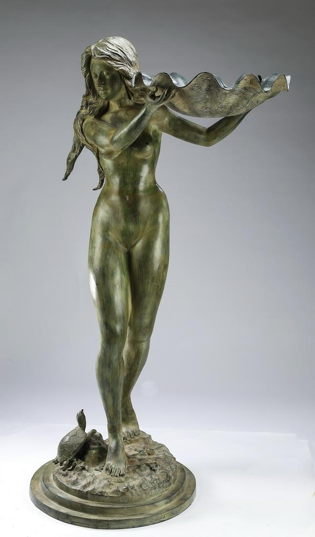 Standing Venus patinated bronze sculpture, 64"h: Contemporary verdigris patinated bronze sculpture of Venus, the goddess depicted nude with long flowing hair holding a shell, rising on a naturalistic base with a small turtle, resting on a stepped ci