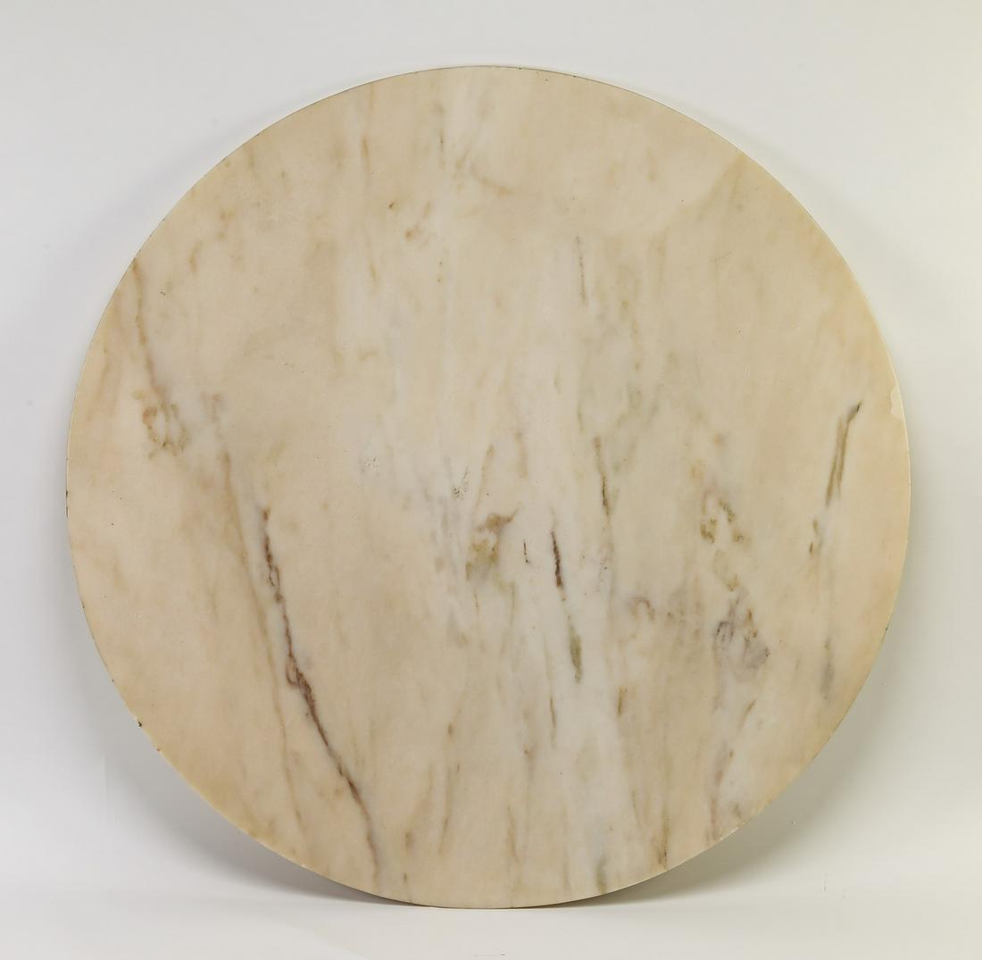 Round cream and taupe marble top, 48"dia: Round cream and taupe marble top, having a polished surface in hues of white, cream and taupe, 48"dia.