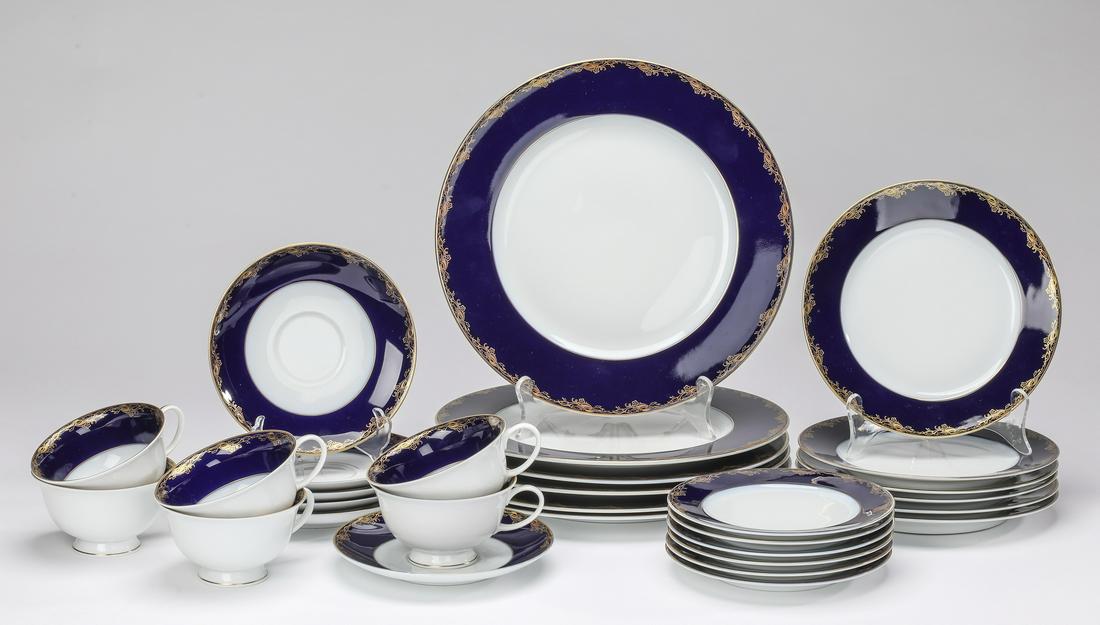 30 pc Rosenthal Frederick the Great table service: Rosenthal porcelain table service for six in the Frederick the Great pattern, having a wide cobalt band embellished with a foliate gilt overlay at the rim, comprising (6) dinner plates, 10.5"dia; (9) 