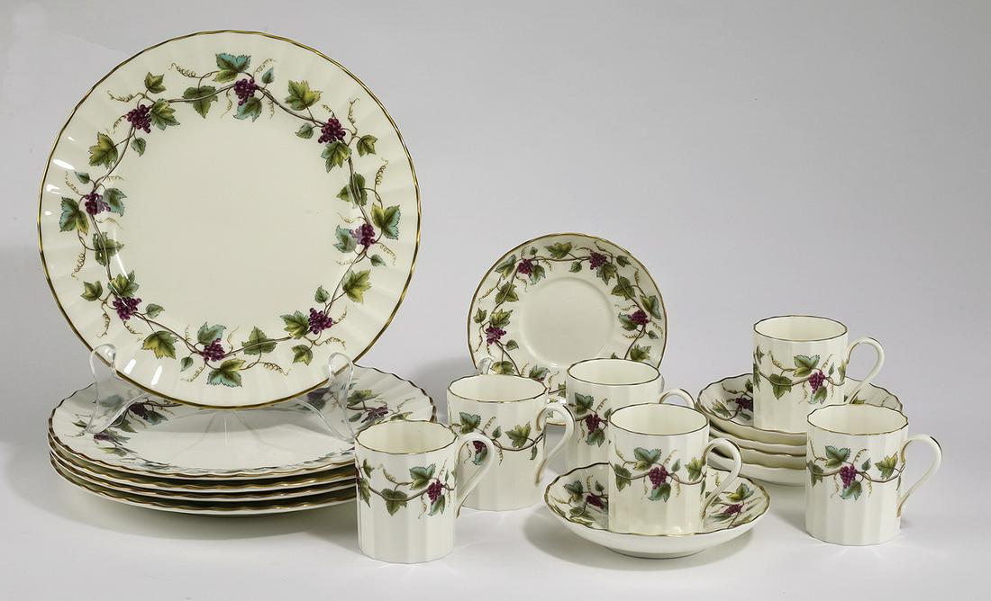 Royal Worcester 'Bacchanal' pattern dessert service: Royal Worcester dessert service for six in the 'Bacchanal' pattern, comprising: (5) dessert plates, 8"dia, (6) fluted demitass cups, and (6) saucers, each decorated with a band of grapevines and clust