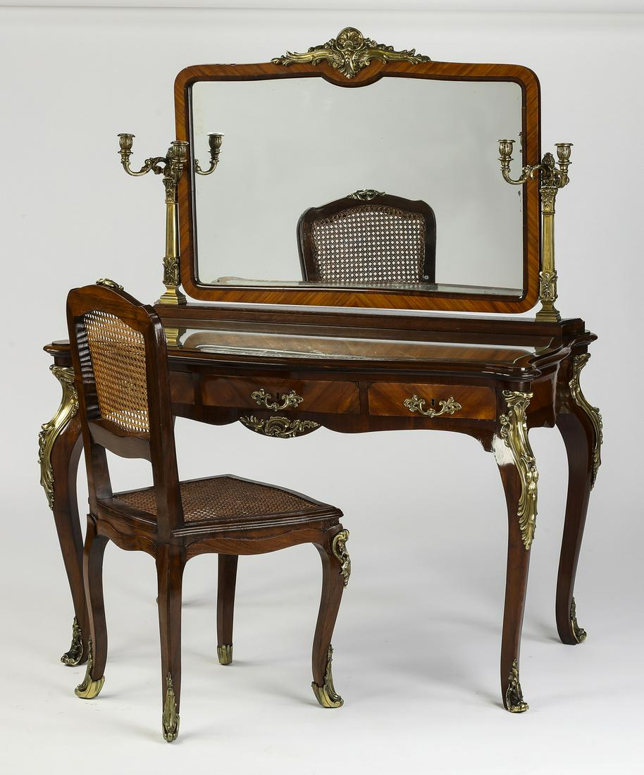 Louis XV style satinwood marquetry vanity and chair: Louis XV style satinwood marquetry vanity with caned chair, the vanity having a rectangular mirror with a bronze scallop cartouche, flanked by a pair of bronze two-arm candelabra, above a serpentine s