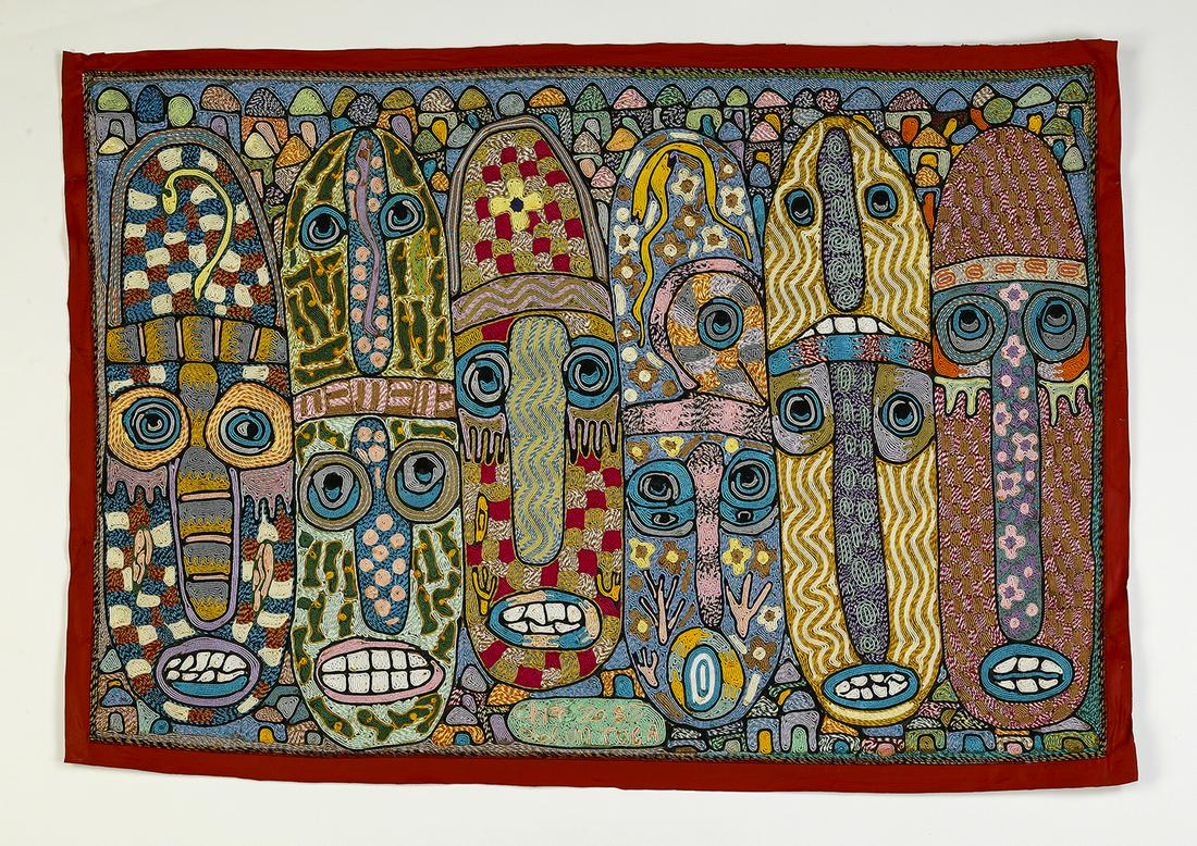 Chief Oloruntoba (Nigerian) signed silk thread work: Chief Zacheus Olowonubi Oloruntoba (Nigerian, 1934-2014) textile artwork, 1985, executed in dyed silk thread on painted canvas, depicting a row of vibrant stylized African masks, signed and dated in t