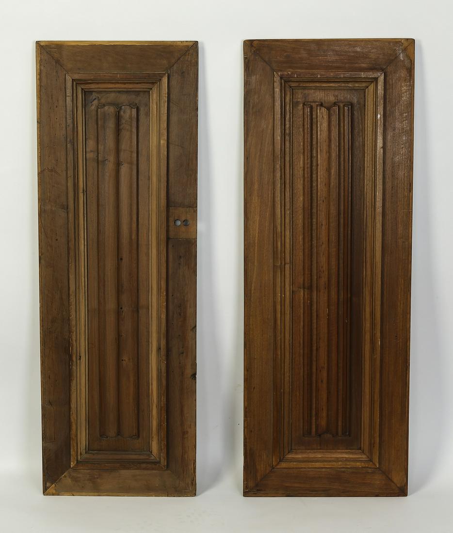 (2) 19th c. Gothic Revival carved linen fold panels: Pair of 19th century Continental Gothic Revival carved walnut linen fold panels, 41"h x 16"w x 1.25"d.