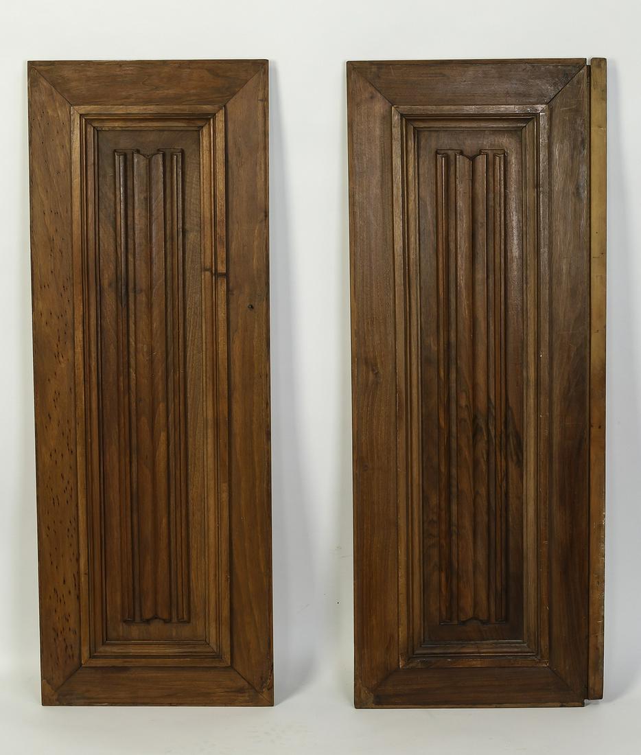 (2) 19th c. Gothic Revival carved linen fold panels: Pair of 19th century Continental Gothic Revival carved walnut linen fold panels, 41"h x 16"w x 1.25"d.