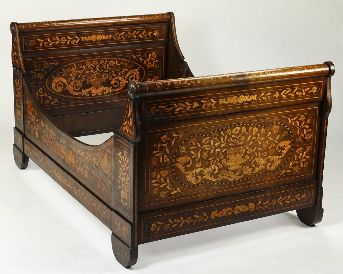 Early 19th c. Continental marquetry inlaid sleigh bed: Continental marquetry inlaid walnut sleigh bed, early 19th century, in the Dutch taste, having a scrolled headboard and footboard with fruitwood marquetry depicting acanthus, flowering vines, and over