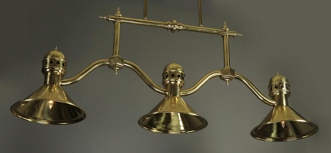 Brass three-light pendant, 76"w: Brass three-light pendant, having an upper bar accented with finials issuing two lower arms, the whole suspending an undulating horizontal standard with three conical shades, each enveloping one light