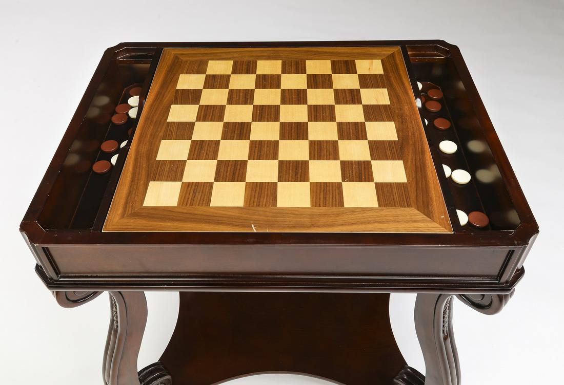 Games table with removable top and convertible boards: Games table in the Renaissance manner, having a removable rectangular top with canted corners and raised carved edge, opening to an interior fitted with a convertible chess and backgammon board and ga