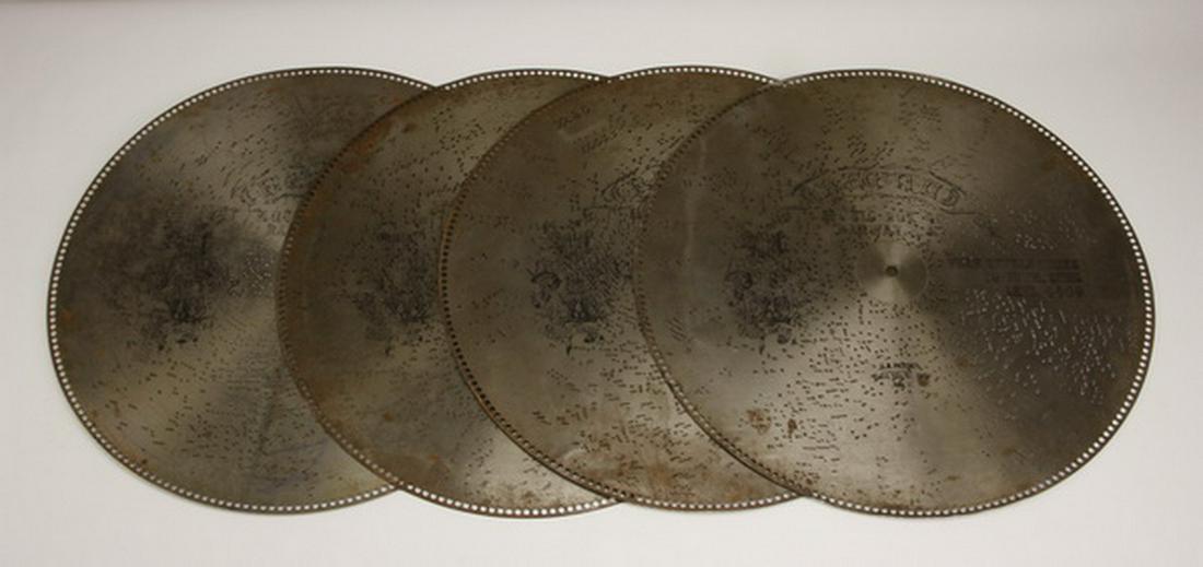 (4) Assorted 27" music discs: Group of (4) 27" music discs. (1) The Tale of a Bumble Bee by Luders; (2) Artistâ€™s Life by Strauss; (3) Soldiers in the Park by Monkton, from The Runaway Girl; (4) When Reuben Comes to Town by 