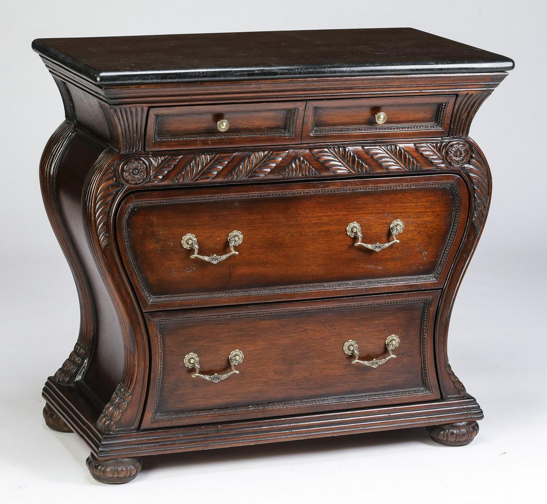 Maitland-Smith style bombe commode: Maitland-Smith style bombe commode, having a tesselated marble top over two aligned frieze drawers, above a foliate carved traverse, surmounting two long drawers, the whole rising on a molded plinth t