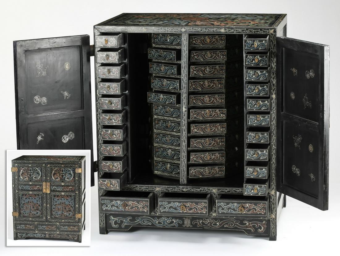 Chinese polychrome lacquer apothecary cabinet, 38"h: Chinese polychrome lacquer apothecary cabinet, having a rectangular top decorated with writhing Ming style dragons and lingzhi fungus framing a Shou symbol, above two doors embellished with fretwork a