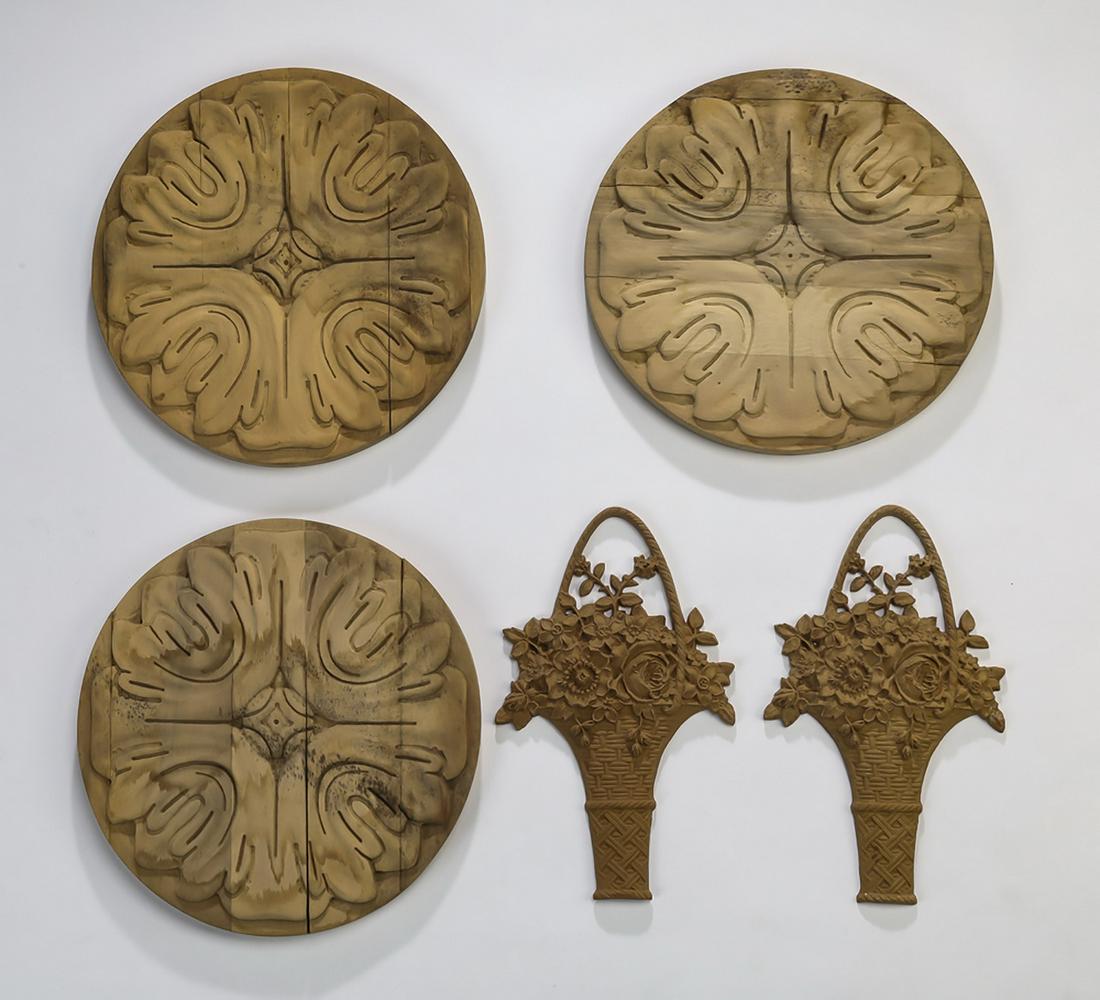 (5) Continental unfinished decorative appliques: Group of (5) Continental unfinished decorative appliques, ready for your own stained or painted finish, including (3) carved rosettes, 10"dia, and (2) cast floral baskets, 9.5"h x 5.75"w.