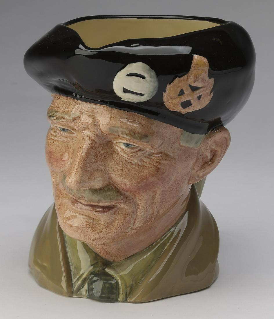 Royal Doulton Toby jug of Field Marshal Montgomery: Royal Doulton porcelain Toby jug of Field Marshal Bernard Montgomery, depicted wearing his black beret adorned with cap badges and a beige uniform, issuing a gray banded handle from the back listing c