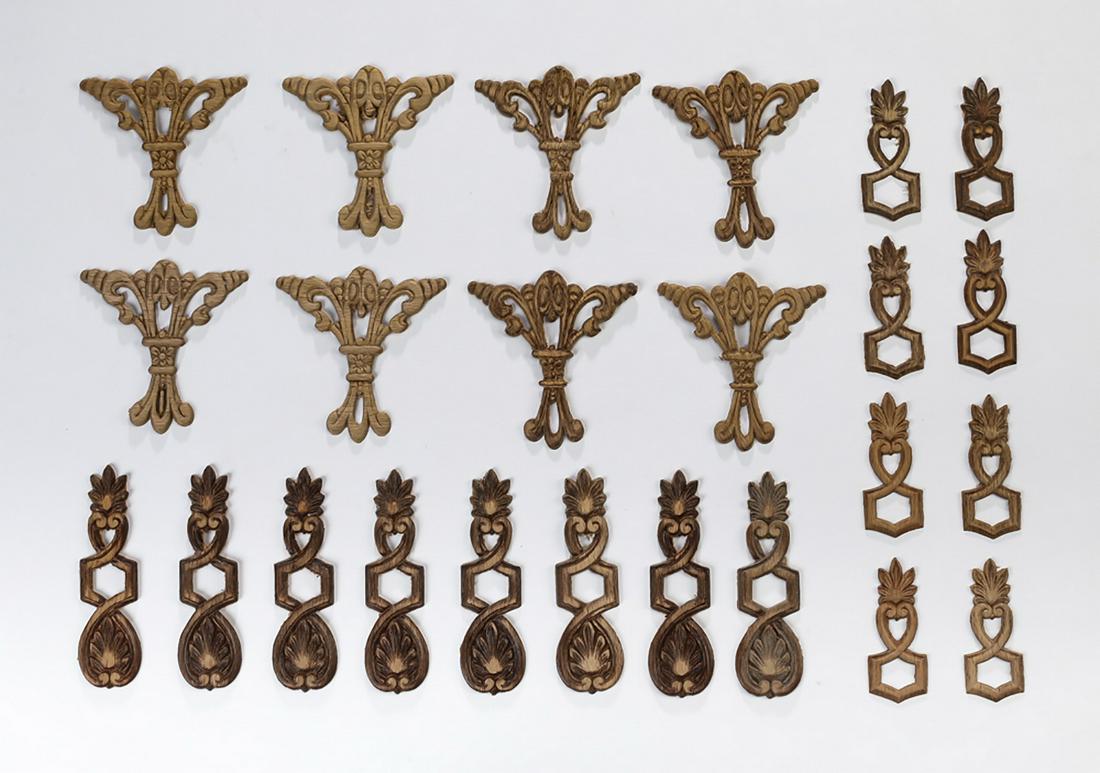(24) Continental carved decorative appliques: Group of (24) Continental carved decorative appliques, ready for your own stained or painted finish, including (8) 4.75"h x 1.25"w, (8) 3"h x 1.25"w, and (8) 3.5"h x 3.5"w.