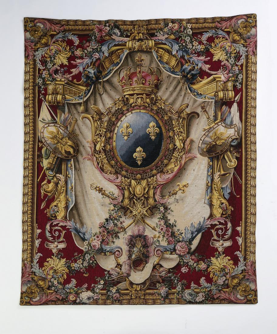 Aubusson style heraldic crest tapestry, 75"h: Aubusson style heraldic crest tapestry, woven by Tapestries Limited, depicting a tromp l'oeil drapery centering a crown surmounting a royal blue crest emblazoned with fleur-de-lis, surrounded by royal