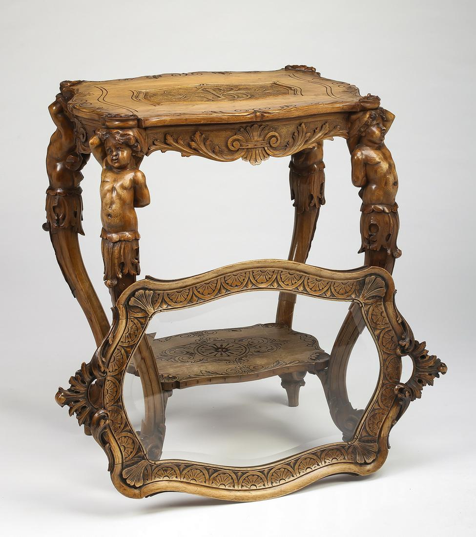 French carved walnut table with beveled glass tray: Continental walnut and beveled glass occasional table with tray in the Louis XV taste, late 19th century, having a removable serpentine glass tray with carved wooden frame and handles, over a monogram