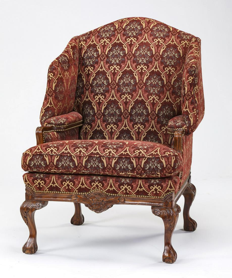Erwin Lambeth upholstered wingback chair: Erwin Lambeth wingback chair in the Chippendale taste, having an arched back flowing into truncated arms, above a seat with a drop-in cushion, upholstered in an Arts and Crafts inspired repeating flor