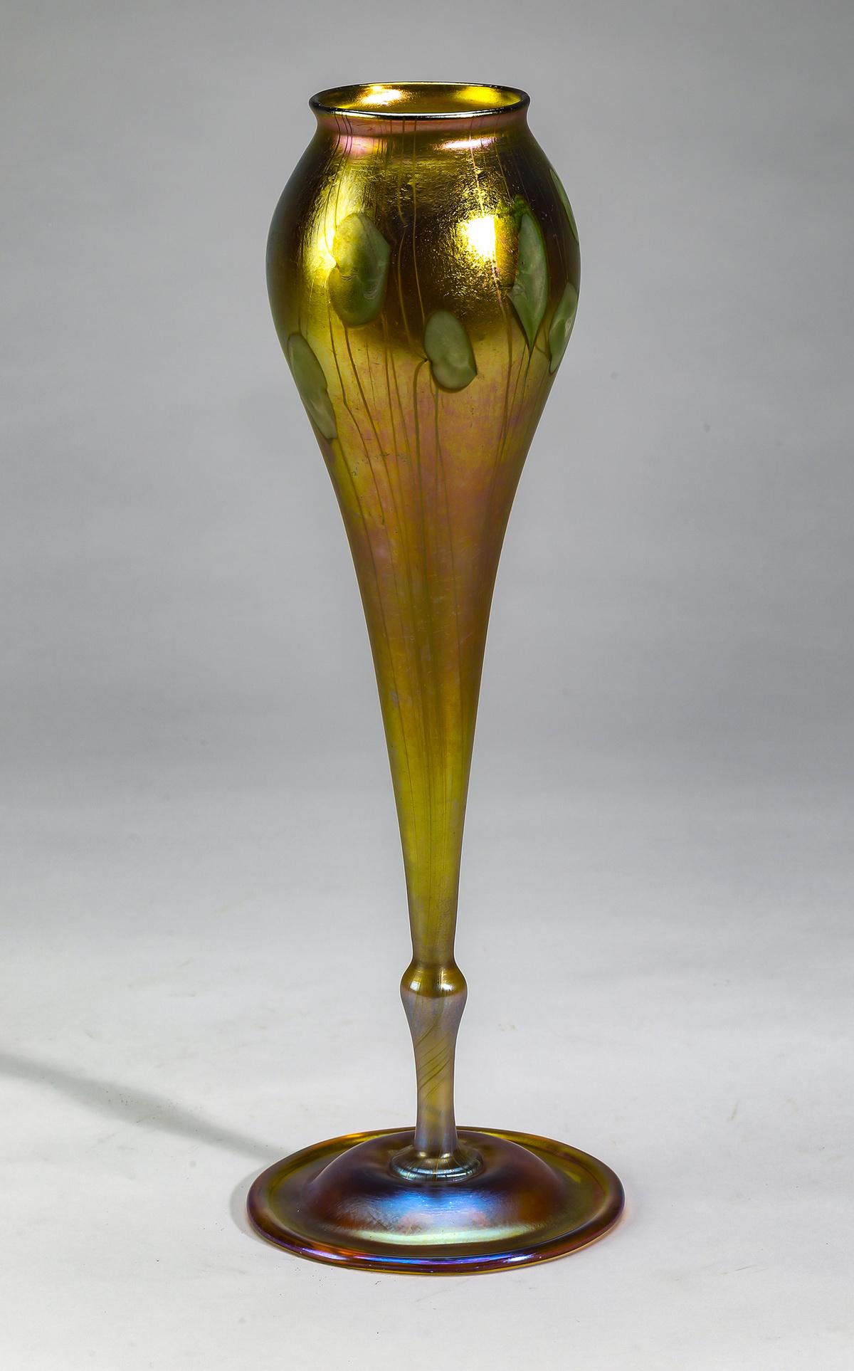 Tiffany Studios style gold favrile vase: Tiffany Studios style gold favrile vase, having a heart and vine design, marked '5581 H L.C. Favrile' to underside, 12"h x 4"dia.