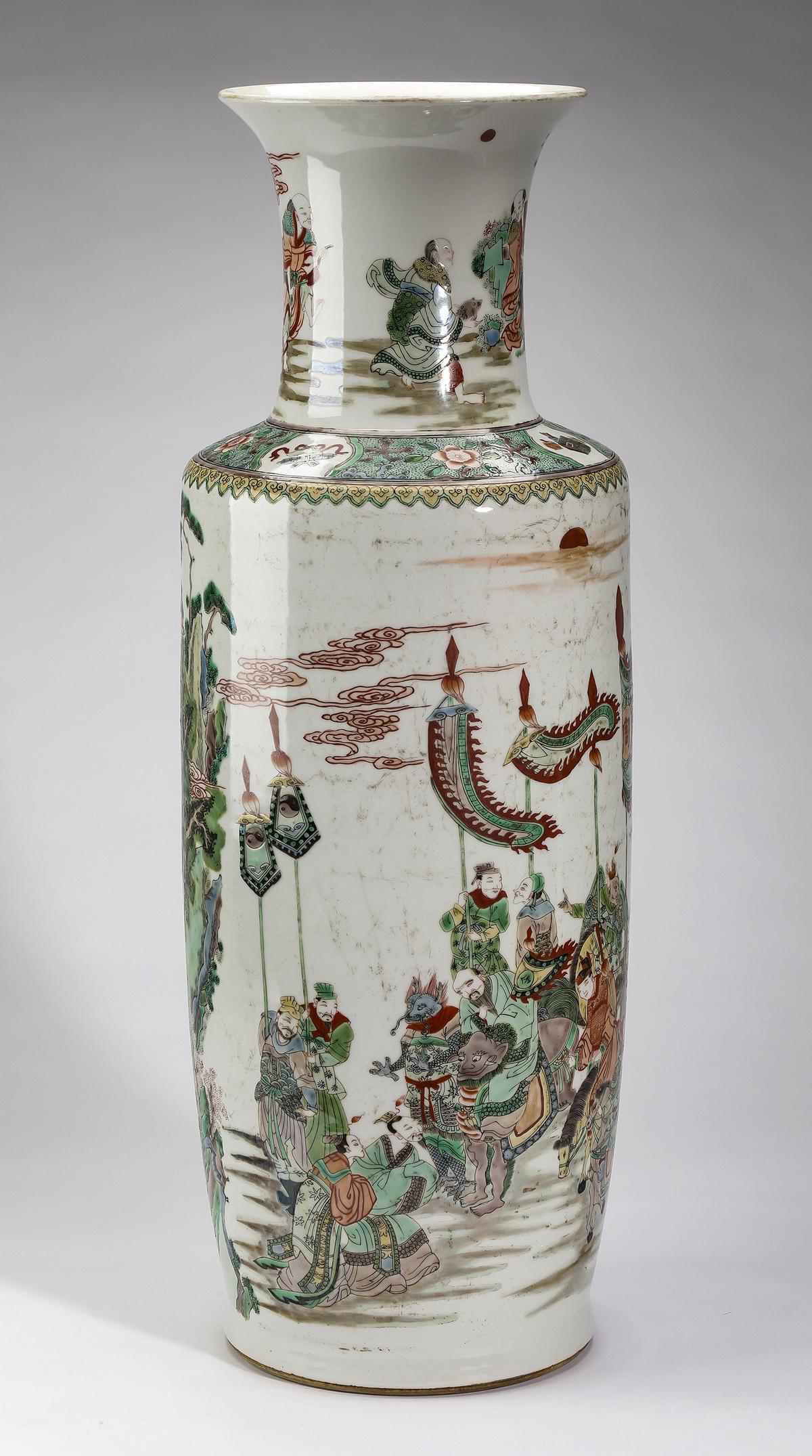 Chinese vase decorated with processional scene: Chinese famille verte baluster vase, having a trumpet neck decorated with luohans above a scene of the Bodhisattva Manjusri riding a Fu lion (symbolizing the guardian of Buddhist doctrines) flanked by