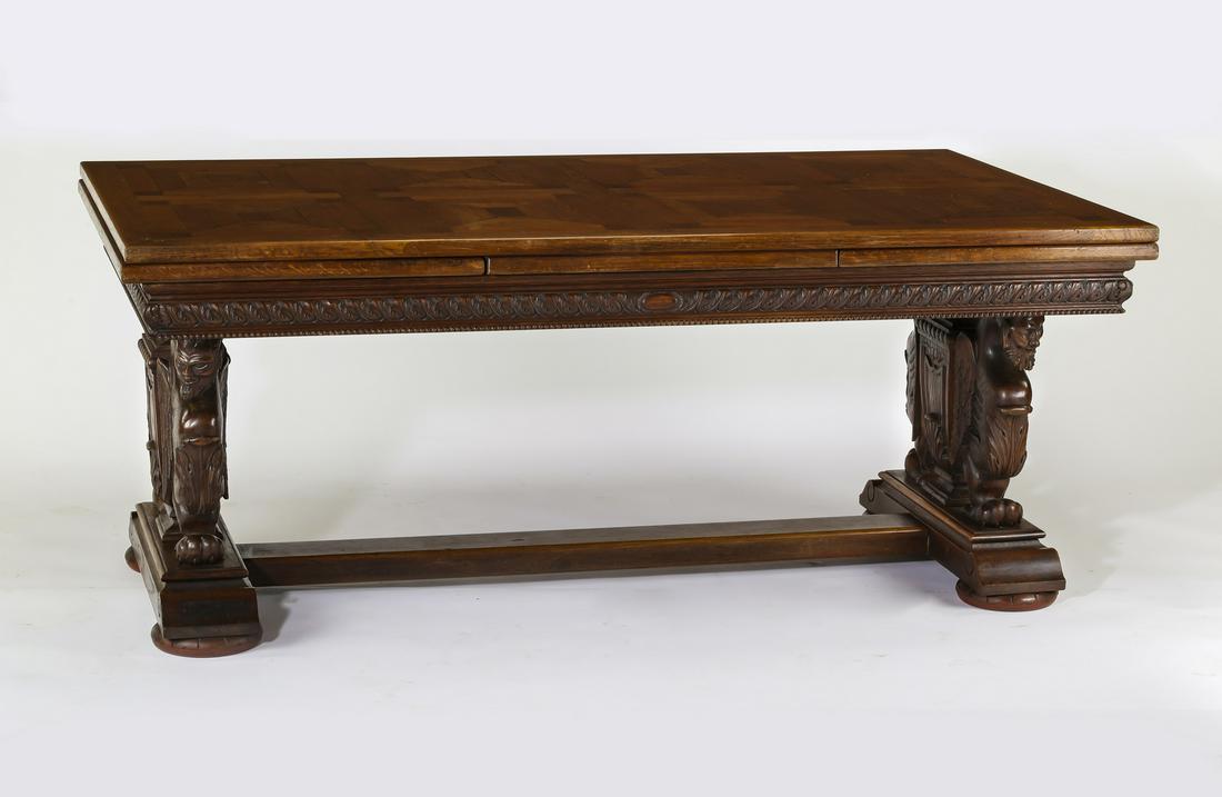 French Renaissance Revival style oak parquetry table: French Renaissance Revival style oak parquetry inlaid table, late 19th century, having a rectangular top with parquetry inlay, above extendable leaves and a molded apron, rising on baluster shaped ped